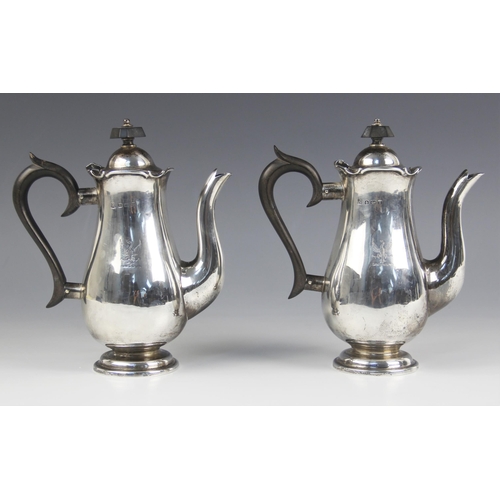 51 - A pair of Edwardian silver bachelors coffee pots, The Alexander Clark Manufacturing Co, Birmingham 1... 