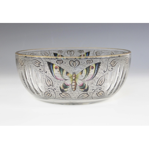 527 - A hand enamelled cut glass fruit bowl, 20th century, decorated with butterflies among scrolls and fo... 