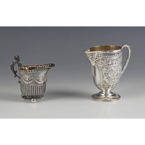 55 - A Victorian silver cream jug, Marshall and Sons, Edinburgh 1886, the crimped rim above embossed garl... 