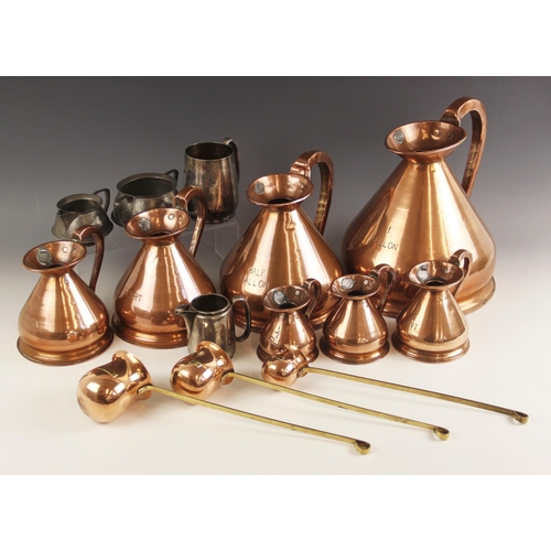 552 - A collection of seven haystack copper measures, late 19th/early 20th century, each applied with a 'H... 