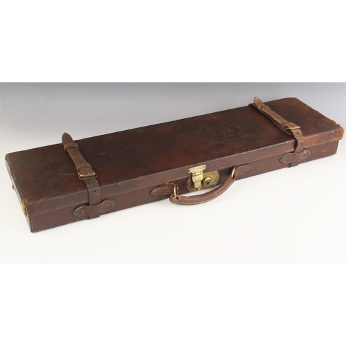 561 - A Holland & Holland leather bound wooden gun case with brass sprung catch and leather over-strap, th... 