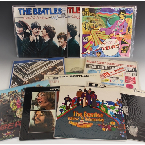 571 - A collection of ten Beatles LPs, comprising: WITH THE BEATLES, HELP!, SGT PEPPERS LONELY HEARTS CLUB... 