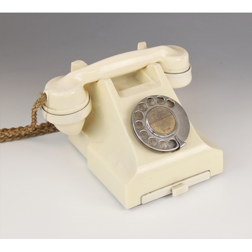 574 - An ivory Bakelite GPO pyramidal telephone, circa 1960's, type 332F S50/2A, with a 164 type handset a... 