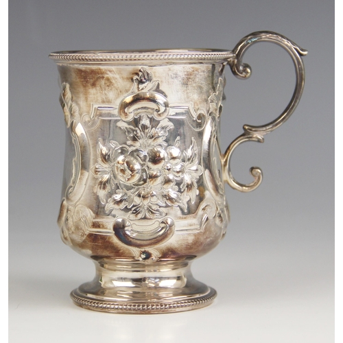 59 - A Victorian silver christening mug, Henry Wilkinson and Co, London 1867, the beaded rim above an emb... 