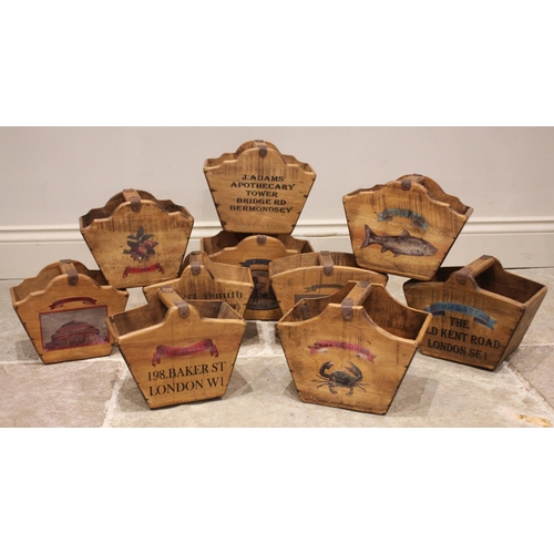 591 - A collection of ten vintage style wooden advertising trugs, each applied with individual fictional r... 