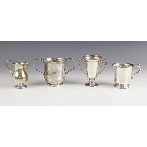 68 - A Victorian silver twin handled presentation cup, Martin Hall and Co, London 1880, with loop handles... 