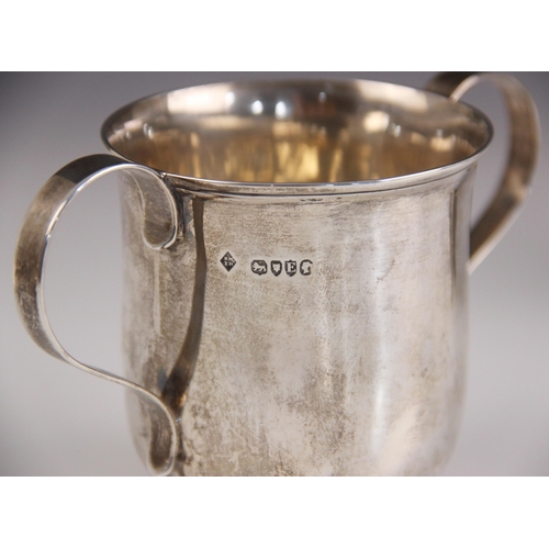 68 - A Victorian silver twin handled presentation cup, Martin Hall and Co, London 1880, with loop handles... 