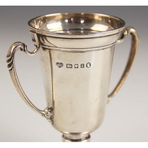 68 - A Victorian silver twin handled presentation cup, Martin Hall and Co, London 1880, with loop handles... 