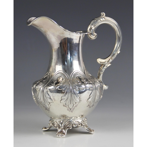 74 - A Victorian silver milk jug, Samuel Hayne and Dudley Cater, London 1845, the moulded rim above an em... 