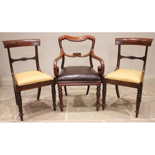 763 - A Regency mahogany elbow chair, the compressed rail back extending to down swept arms with scrolled ... 