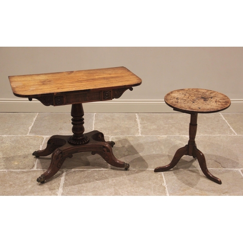 773 - A William IV mahogany tea table, the fixed rectangular top above a carved frieze upon a turned balus... 