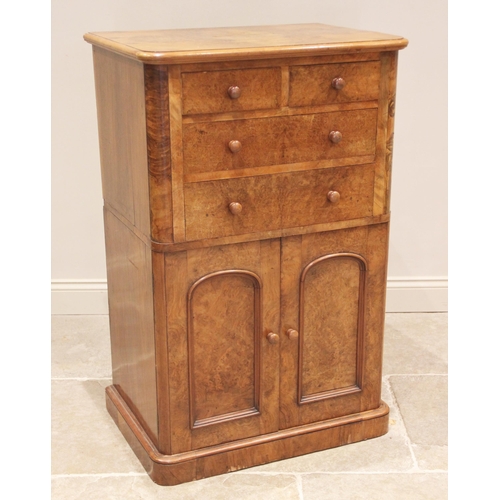 794 - A Victorian figured walnut tall boy/chest of drawers, the quarter veneered top with rounded front co... 