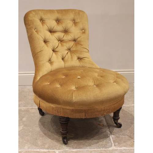 798 - A Victorian walnut and upholstered low seat chair, in gold velour fabric, the button back and circul... 