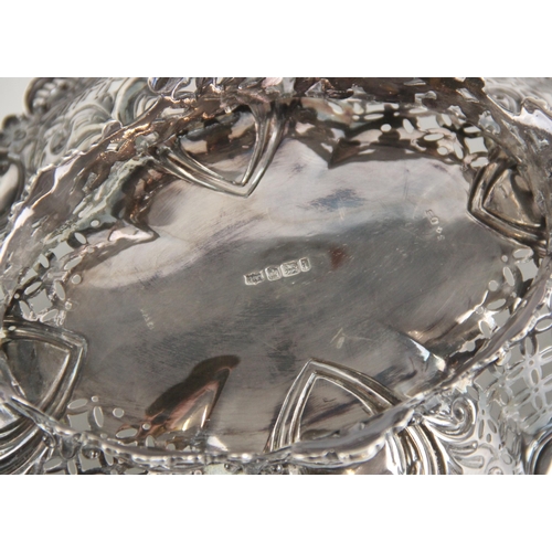 82 - An Edwardian silver dish, Mappin and Webb Ltd, Sheffield 1901, the floral and scroll embossed rim ab... 