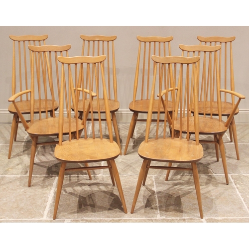 828 - A set of eight Ercol blonde elm and beech 'Goldsmith' dining chairs, mid 20th century, each with a c... 