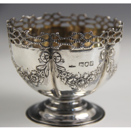 83 - An Edwardian silver cream jug and sugar bowl, Mappin and Webb Ltd, London 1902, each with  openwork ... 