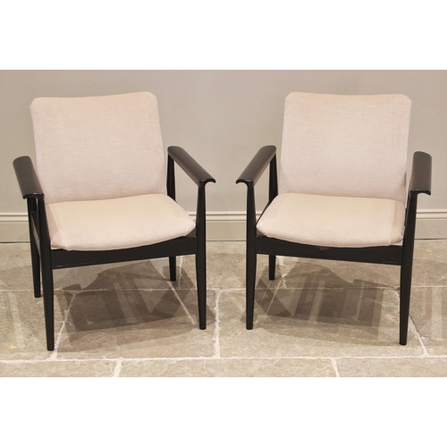 836 - Finn Juhl for France & Son, a pair of Danish ebonised 'Diplomat' chairs, mid 20th century, in ivory ... 