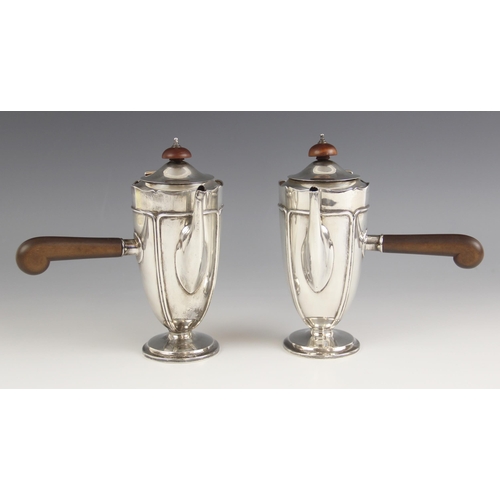 94 - A pair of George V silver side pouring chocolate or coffee pots, Mappin and Webb Ltd, Sheffield 1913... 