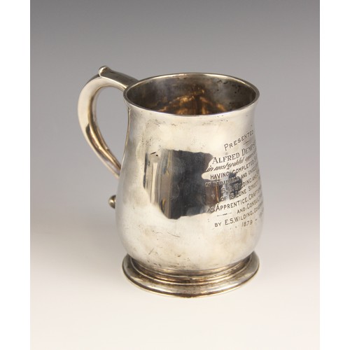 16 - A George II silver mug, possibly William Fordham or William Fleming, London 1730, of baluster form o... 
