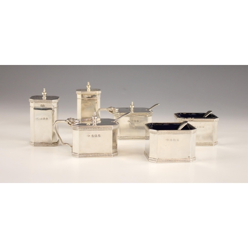 122 - A George VI silver condiments set, A E Poston and Co Ltd, Birmingham 1939, comprising two pepperette... 