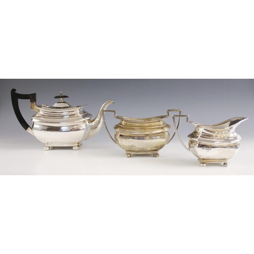 124 - A George V silver tea service, Walker and Hall, Sheffield 1924-1927, comprising teapot, milk jug and... 