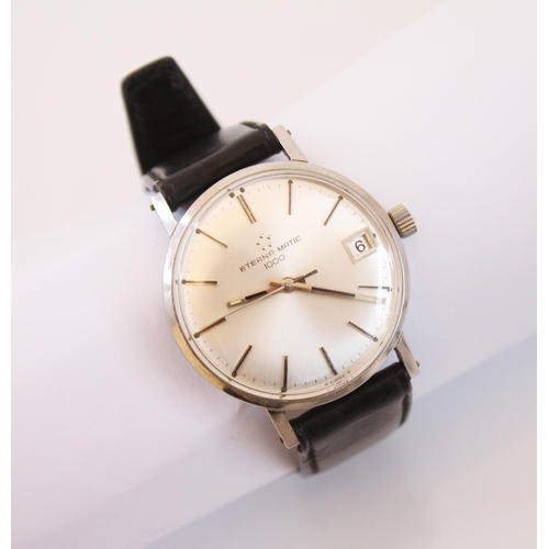 166 - A gentleman's stainless steel Eterna wristwatch, the circular silver coloured dial with baton marker... 