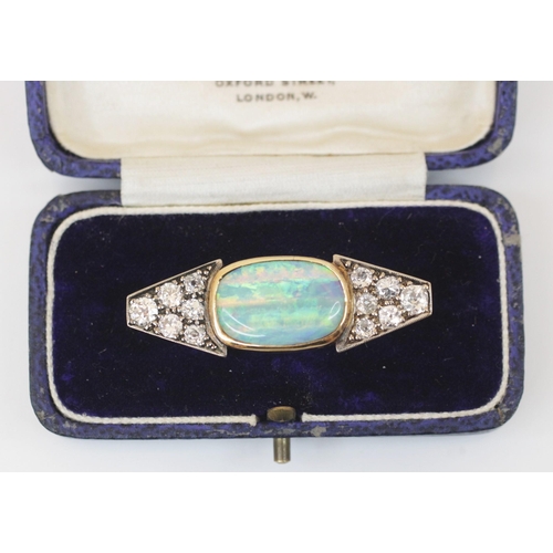 182 - An Art Deco precious opal and diamond brooch, the central cabochon opal (weight estimated 5.60carats... 