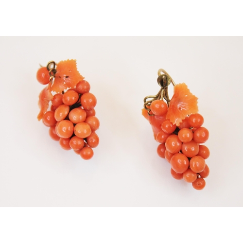 201 - A coral bead necklace, designed as one hundred three uniform circular beads, with yellow metal bolt ... 