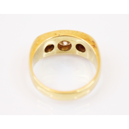 217 - A diamond and 18ct yellow gold ring, the central round cut diamond with small round cut diamond to e... 