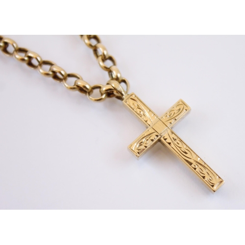 231 - A 9ct yellow gold cross, the cross with engraved scrolling detail, marked 'PMS' London 1990, 2.5cm l... 