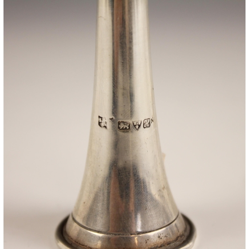 3 - An Edwardian silver novelty candle snuffer, S Blanckensee and Son Ltd, Chester 1908, modelled as a h... 