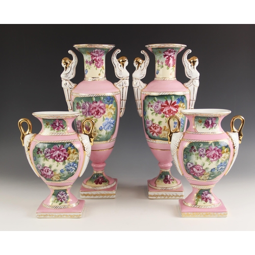 460 - A pair of Paris porcelain style vases, 20th century, of urn form with twin handles modelled as angel... 