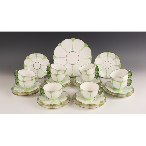 465 - An Aynsley tea service, early 20th century, each piece decorated with a stylised flower against a gr... 