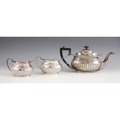 89 - A silver tea service, W A Humphries Ltd, Birmingham 1976, comprising a teapot, milk jug and sugar bo... 