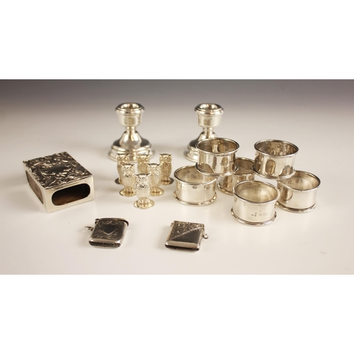 123 - A selection of silver items, including a set of six Edwardian silver circular napkin rings, Walker a... 