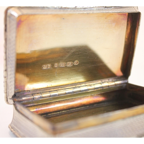 130 - A Victorian silver rectangular presentation box, George Unite Birmingham 1874, the cast floral rim e... 