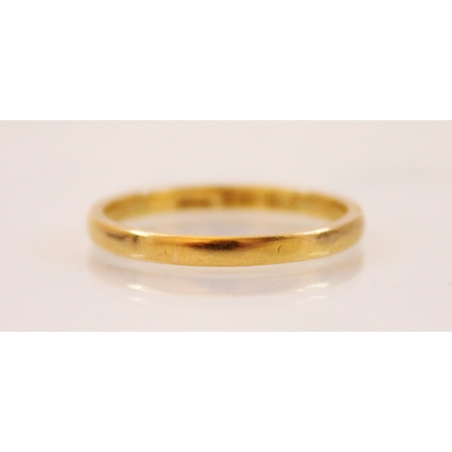 186 - A 22ct yellow gold wedding band, marked for Birmingham 1941, ring size N, weight 2.6gms, indistinct ... 