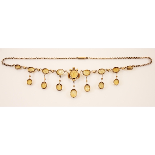 194 - A mid-20th century citrine and seed pearl fringe necklace, designed as nine graduated oval cut citri... 