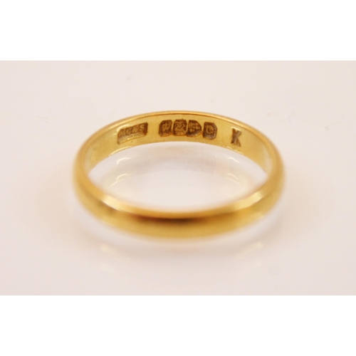 197 - A 22ct yellow gold wedding band, marks for ‘WC and S’, Chester 1939, ring size K, 3.1gms