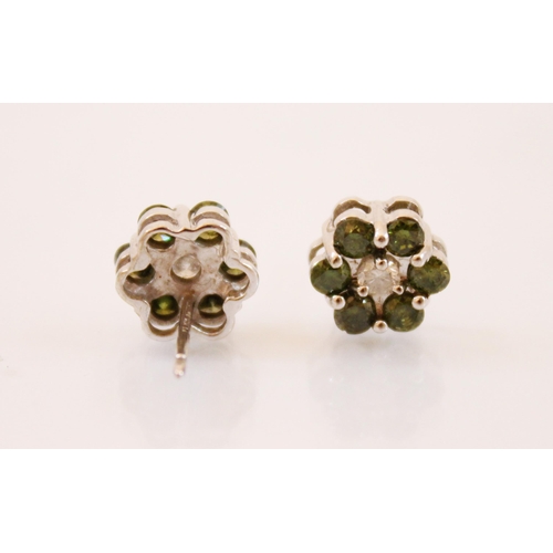 209 - A pair of ‘green’ colour treated diamond and diamond cluster earrings, designed as a flower head wit... 