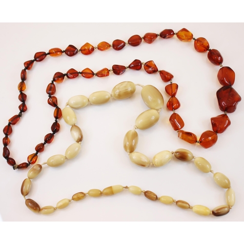 210 - A graduated amber necklace, comprising forty-six free form shaped beads, ranging from 12mm – 30mm in... 