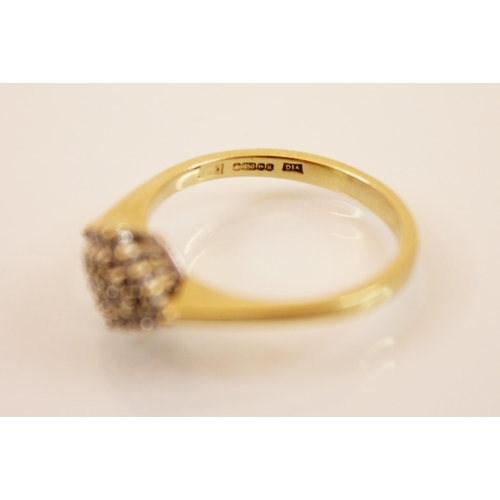 233 - An 18ct yellow gold diamond ring, the head designed as a lozenge shaped diamond set cluster, set to ... 