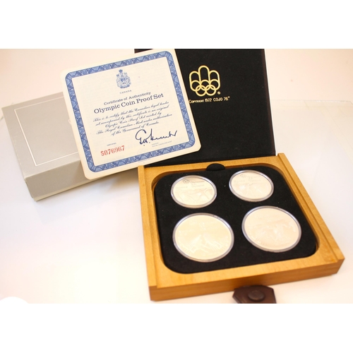 275 - A sterling silver cased 'Olympic coin proof set' minted by The Royal Canadian Mint, the coins depict... 