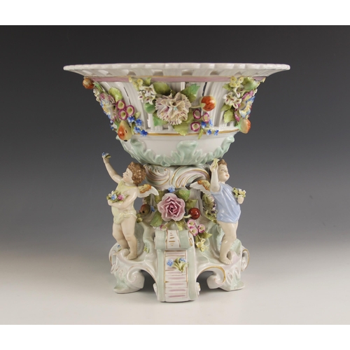 472 - A German porcelain fruit comport, 19th century, probably C. G. Schierholz & Sohn, the florally encru... 