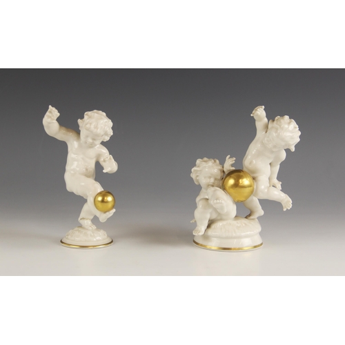 477 - A German porcelain figural group, 20th century, modelled as two putti playing with a gilt ball, prin... 