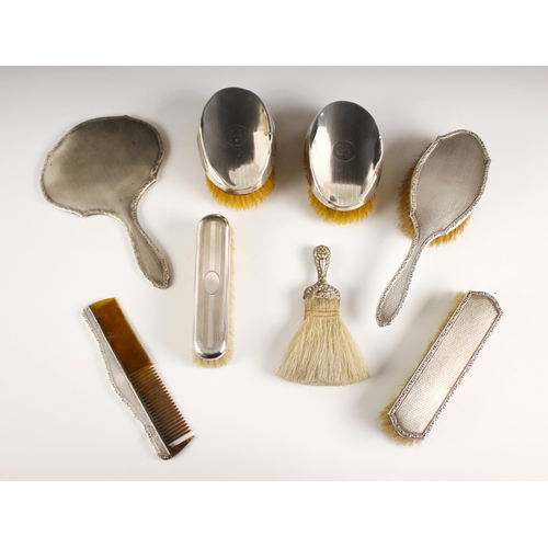 127 - A pair of George V silver backed brushes, S Blanckensee and Sons Ltd, Birmingham 1932, with engine t... 