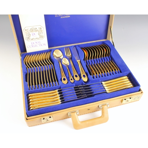 141 - A Royal Collection 'Solingen' canteen of cutlery, the twelve place gold plated setting setting with ... 