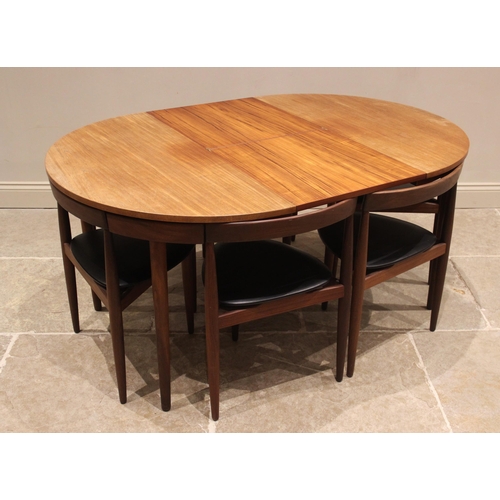 839 - Frem Rojle Denmark, a teak 'Roundette' dining table with six integral chairs, mid 20th century, each... 