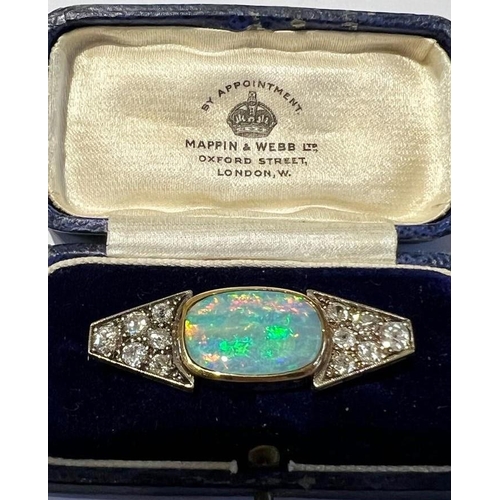 182 - An Art Deco precious opal and diamond brooch, the central cabochon opal (weight estimated 5.60carats... 