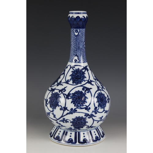 446 - A Chinese porcelain blue and white vase, decorated with elaborate floral Lotus scrolls, of bulbous s... 